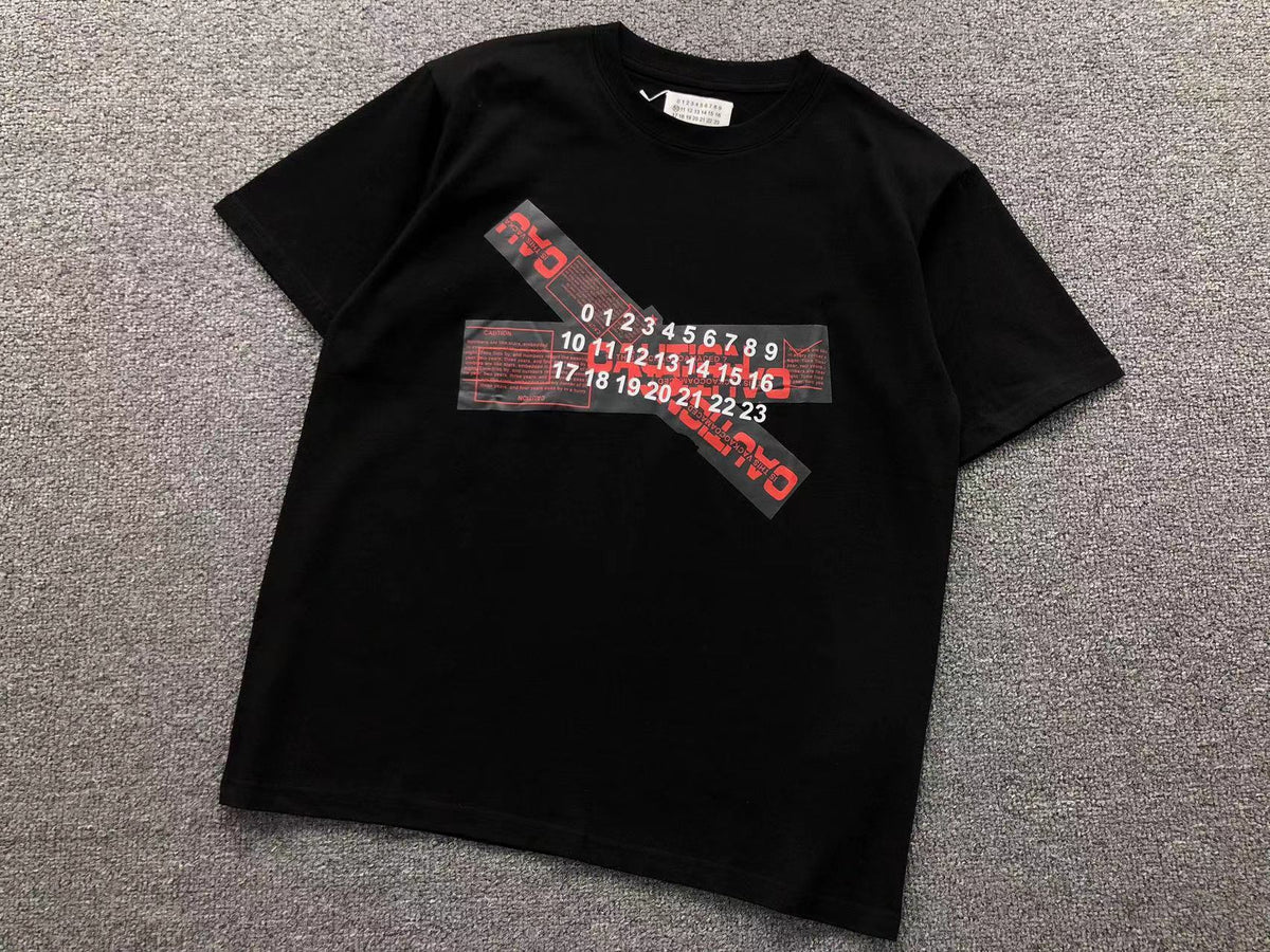 Camiseta Maison Margiela Caution