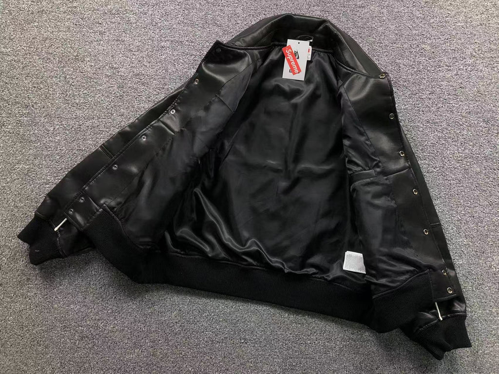 Jaqueta Nike x Supreme Varsity
