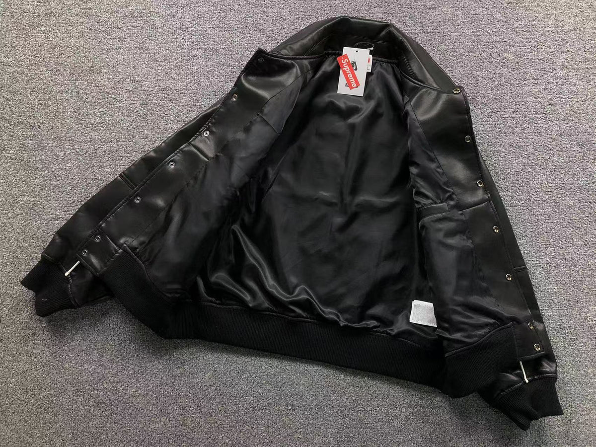 Jaqueta Nike x Supreme Varsity
