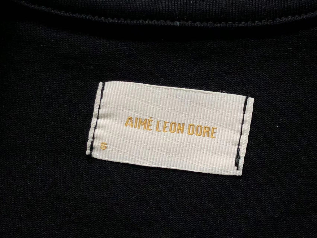 Camiseta Aimé Leon Dore A Family Business