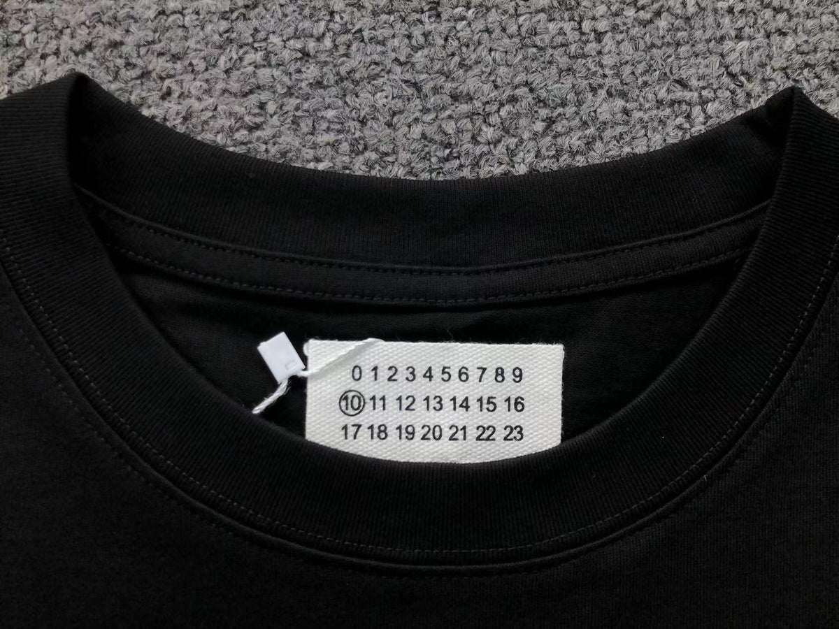Camiseta Maison Margiela Caution