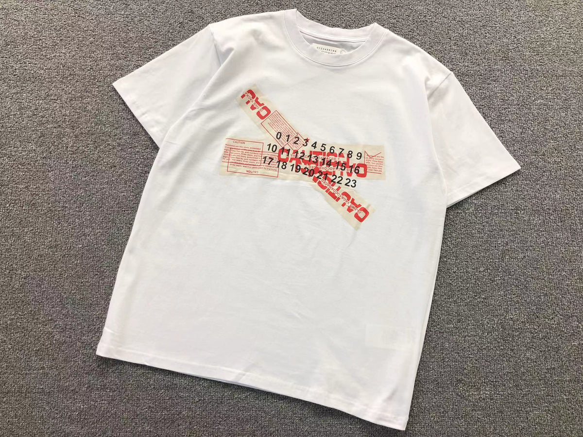Camiseta Maison Margiela Caution