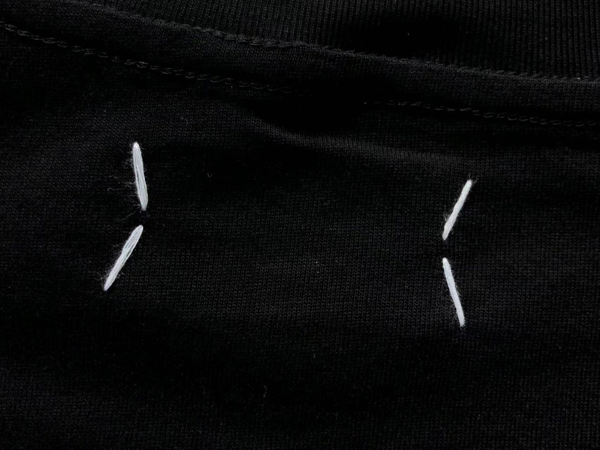 Camiseta Maison Margiela Caution