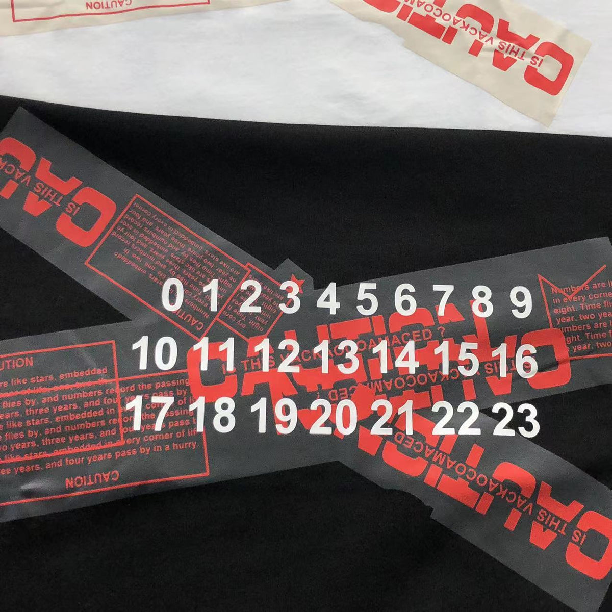 Camiseta Maison Margiela Caution